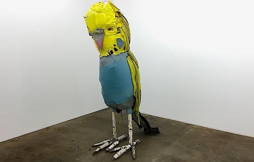 Matthias Garff: Goldi, 2015, birch, trunks, tires, plastics, aluminum, screws, lake, 290 x 100 x 180 cm

